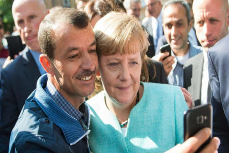 سياسة ميركل تجاه اللاجئين تُتوج بجائزة ”مصباح السلام“ للقديس فرنسيس